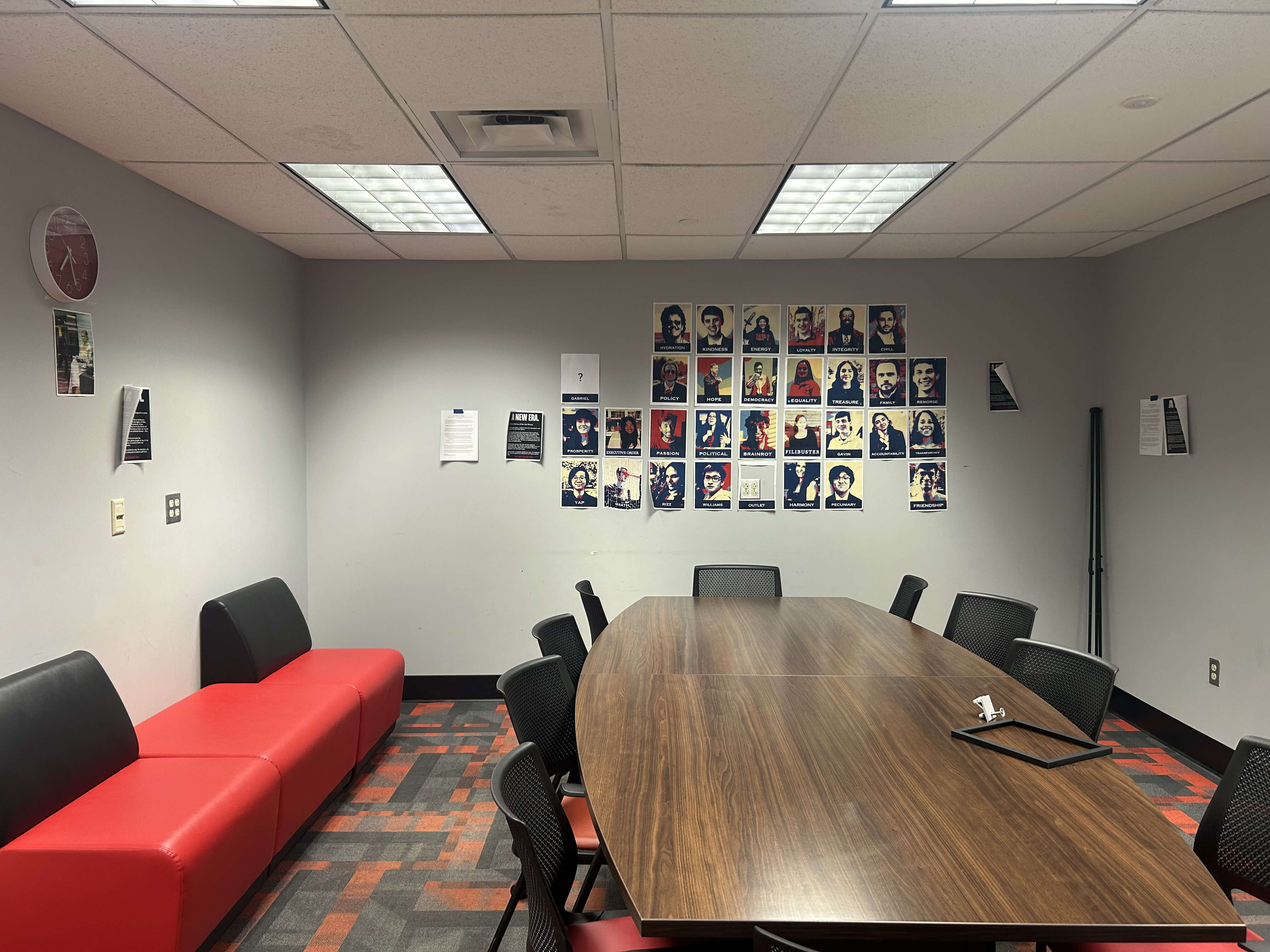 Inside of the Club Library, with a long conference table and chairs.